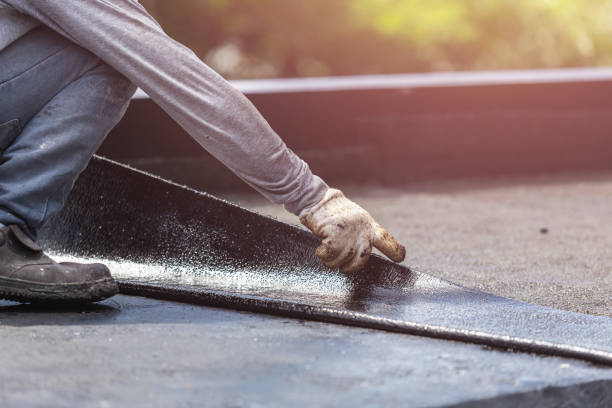 Professional Exterior Waterproofing technician working in Madisonville, KY